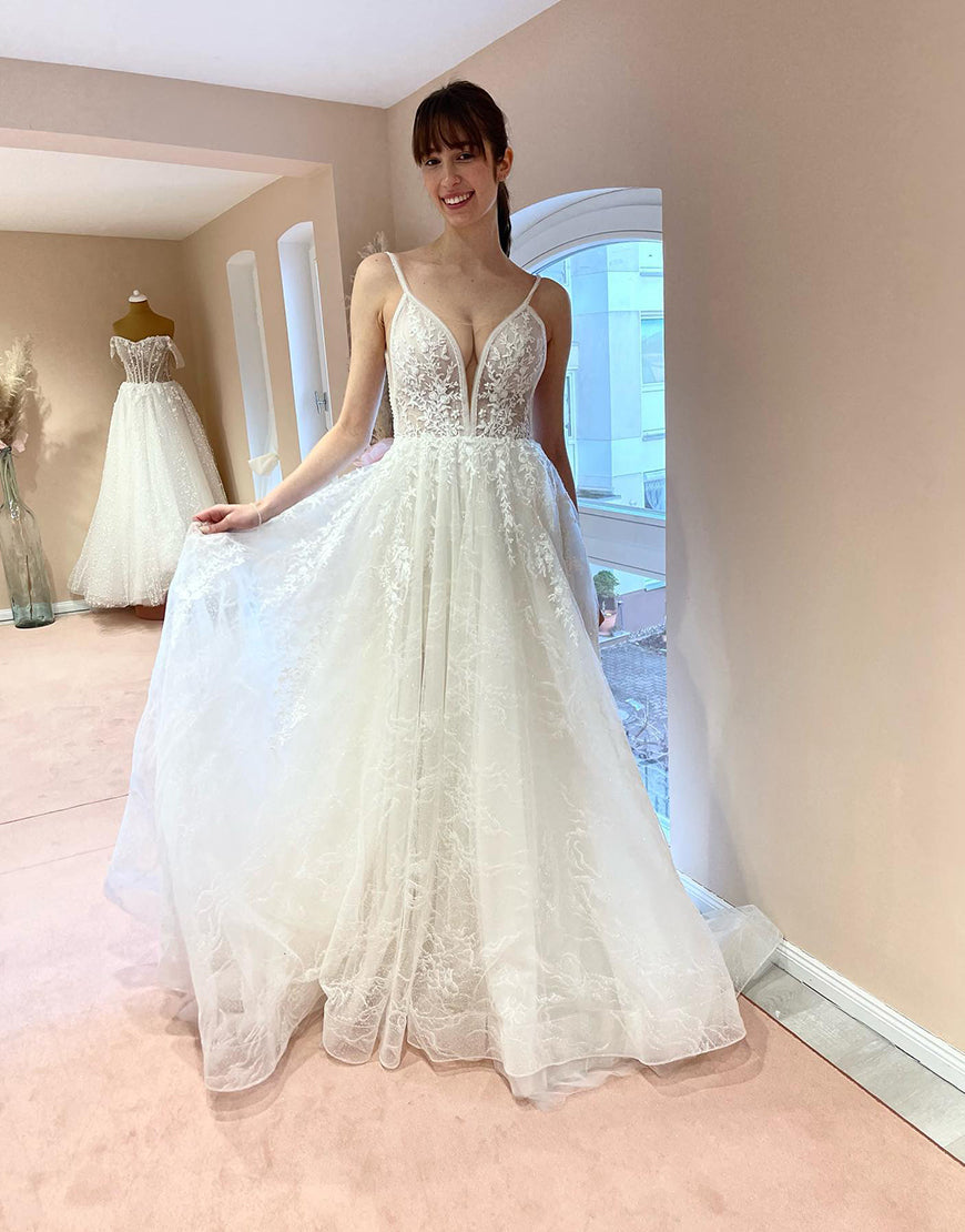 Luolandi A Line Spaghetti Straps Ivory Long Bridal Dress Open Back Wedding Dresses
